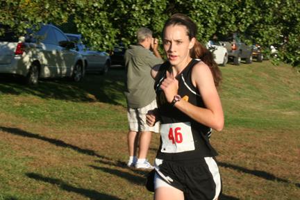 Sarah Rourke, sophomore, runs at Shawnee Mission Park on Oct. 7. 