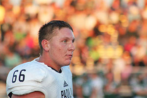 Dunkan Watrous takes a breather between plays against the DeSoto Sept. 11. The Panthers lost  23-7.
