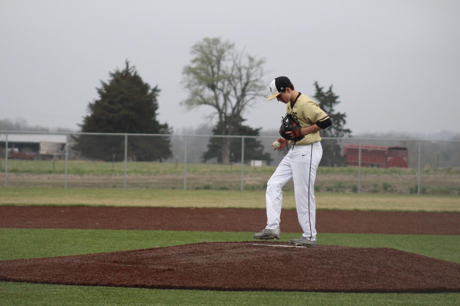 Freshman Caden Bressler steps up to the mound for the first time on varsity.